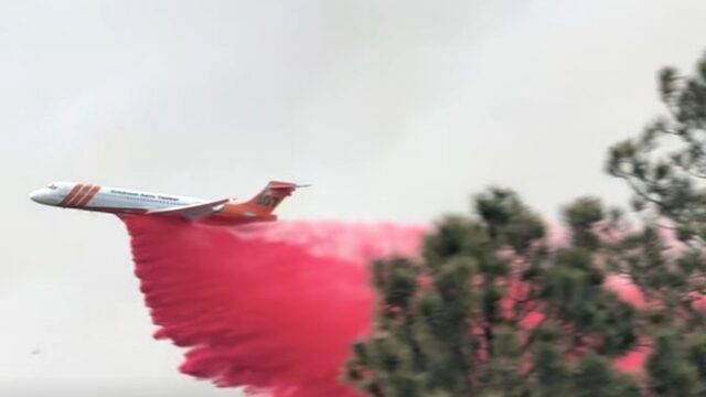 U.S. Forest Service dumps Fire Retardant on Hummingbird Fire